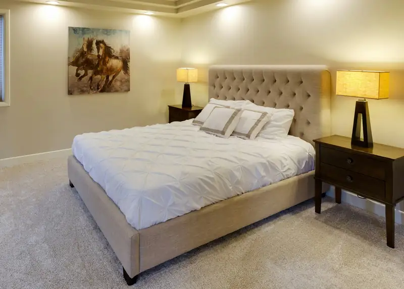 Bedroom with a made bed